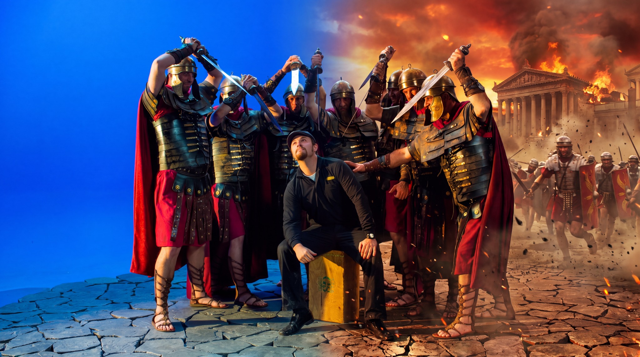 Wayne seated among the costumed cast in a composite transitioning from blue screen to a finished cinematic environment
